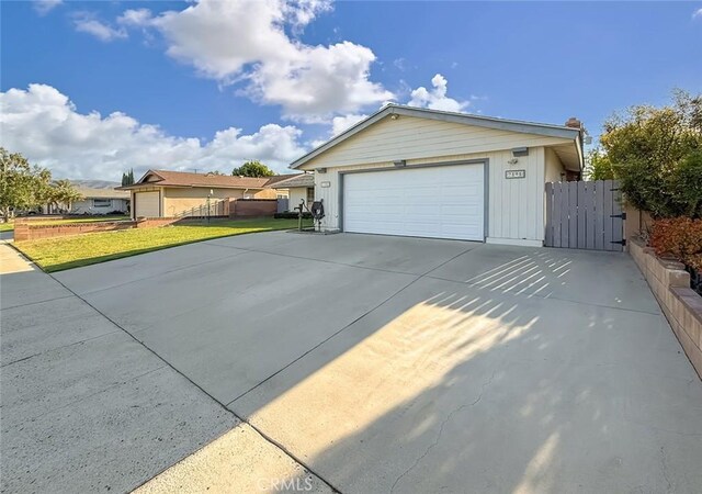 2191 Hilldale Ave, Simi Valley, CA 93063 - view of front facade with a garage and concrete driveway