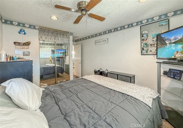2191 Hilldale Ave, Simi Valley, CA 93063 - carpeted bedroom featuring a closet, a textured ceiling, and ceiling fan
