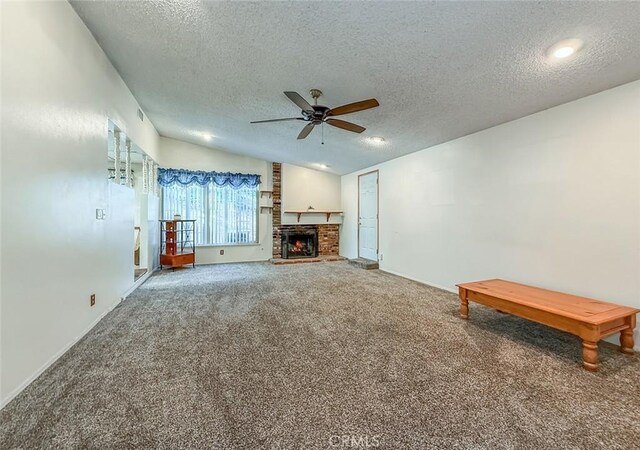 2191 Hilldale Ave, Simi Valley, CA 93063 - carpeted living area with ceiling fan, a textured ceiling, a fireplace, and lofted ceiling