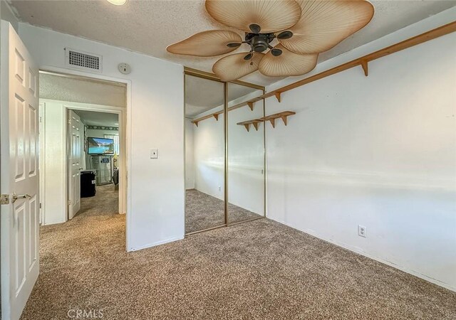 2191 Hilldale Ave, Simi Valley, CA 93063 - unfurnished bedroom with carpet floors, a closet, and a ceiling fan