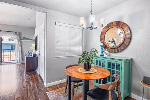 4658 Ohio St, San Diego, CA 92116 - dining room featuring wood finished floors and a chandelier