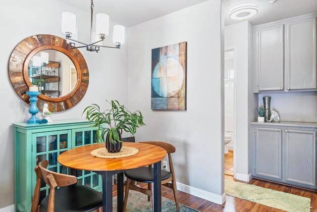 4658 Ohio St, San Diego, CA 92116 - dining area with a chandelier and dark wood-style floors
