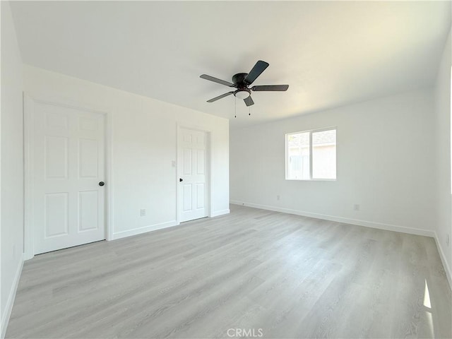842 W Palmer St, Compton, CA 90220 - unfurnished bedroom featuring light wood finished floors and ceiling fan