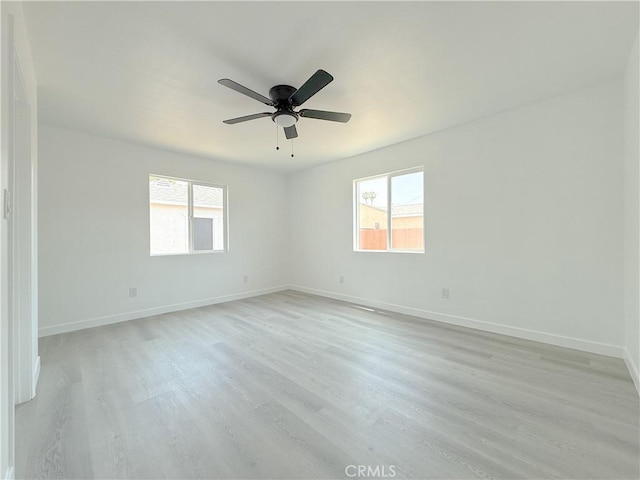 842 W Palmer St, Compton, CA 90220 - spare room with plenty of natural light, light wood-style flooring, and ceiling fan