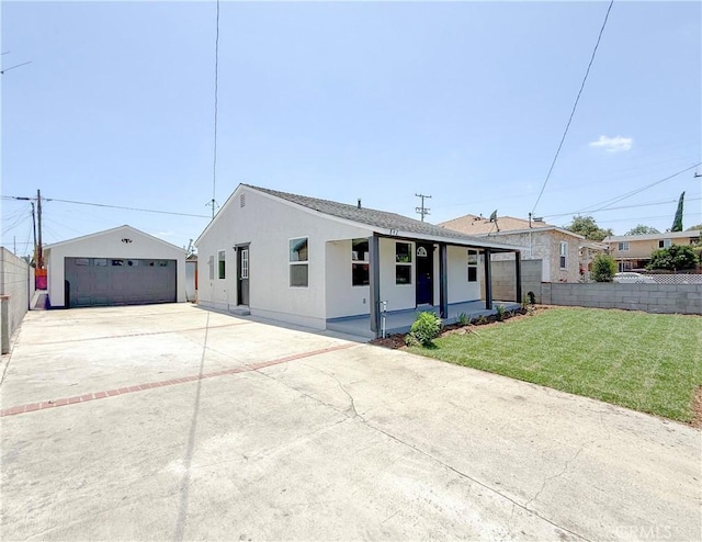 842 W Palmer St, Compton, CA 90220 - ranch-style house with an outbuilding, a detached garage, and stucco siding