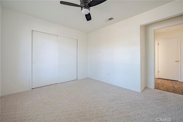1584 Portola Way, Merced, CA 95348 - unfurnished bedroom with carpet floors, a closet, and ceiling fan
