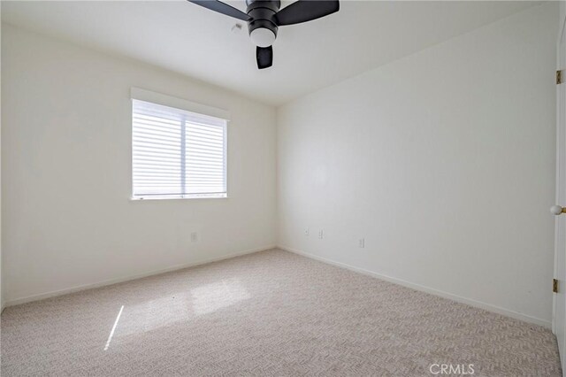 1584 Portola Way, Merced, CA 95348 - unfurnished room with light colored carpet and a ceiling fan