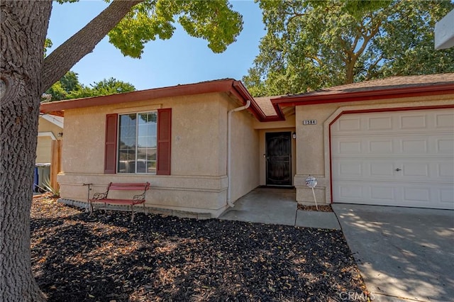 1584 Portola Way, Merced, CA 95348 - ranch-style house featuring an attached garage and stucco siding
