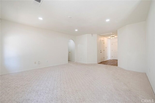 1584 Portola Way, Merced, CA 95348 - spare room with recessed lighting, light colored carpet, and arched walkways