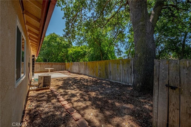 1584 Portola Way, Merced, CA 95348 - fenced backyard with a patio area