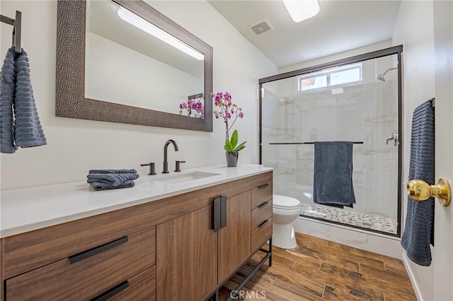 1584 Portola Way, Merced, CA 95348 - full bath featuring vanity, a shower stall, and wood finished floors