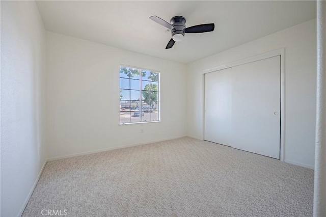 1584 Portola Way, Merced, CA 95348 - unfurnished bedroom with carpet floors, a closet, and ceiling fan