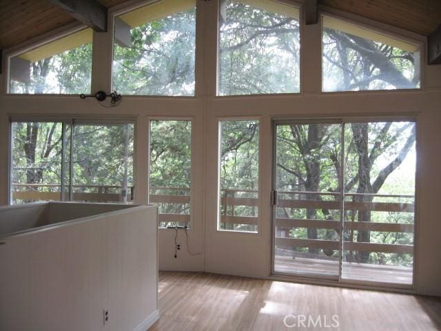 2756 Circle Dr, Running Springs, CA 92382 - doorway with beam ceiling, wood finished floors, and high vaulted ceiling