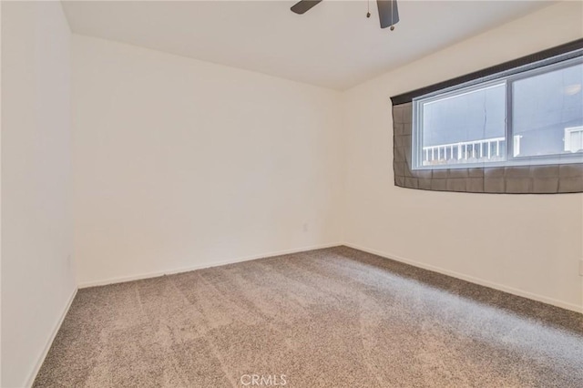 343 E 98th St, Los Angeles, CA 90003 - carpeted empty room with ceiling fan and baseboards