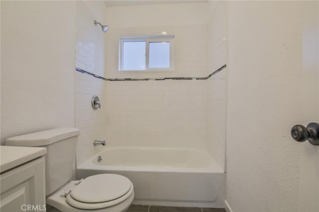 343 E 98th St, Los Angeles, CA 90003 - bathroom with vanity, a textured wall, and tub / shower combination