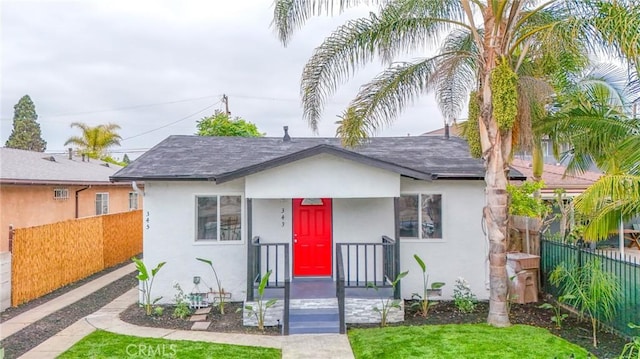 343 E 98th St, Los Angeles, CA 90003 - bungalow-style home with stucco siding and a shingled roof