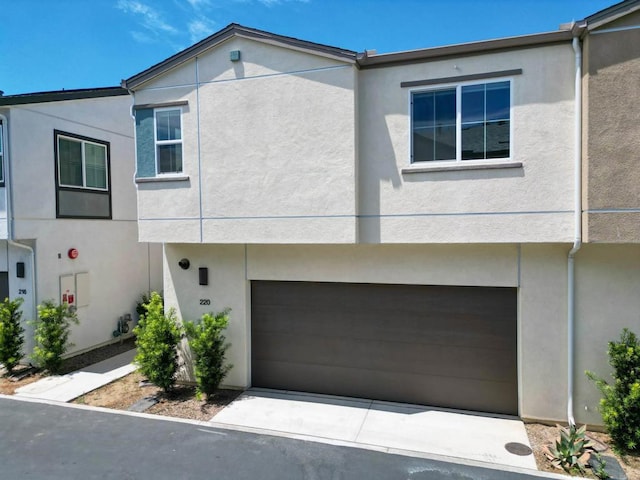 220 Perennial Pl, Fallbrook, CA 92028 - view of front of property featuring stucco siding and an attached garage
