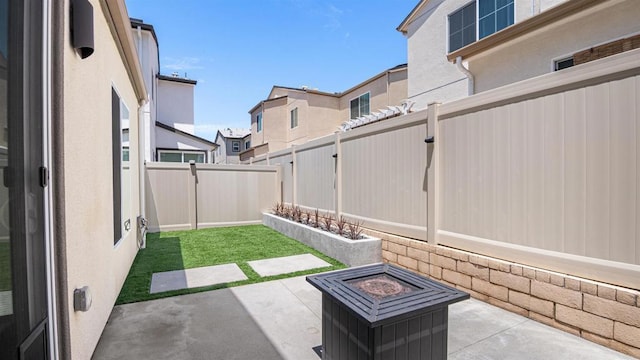220 Perennial Pl, Fallbrook, CA 92028 - fenced backyard with a patio area, a residential view, and a fire pit