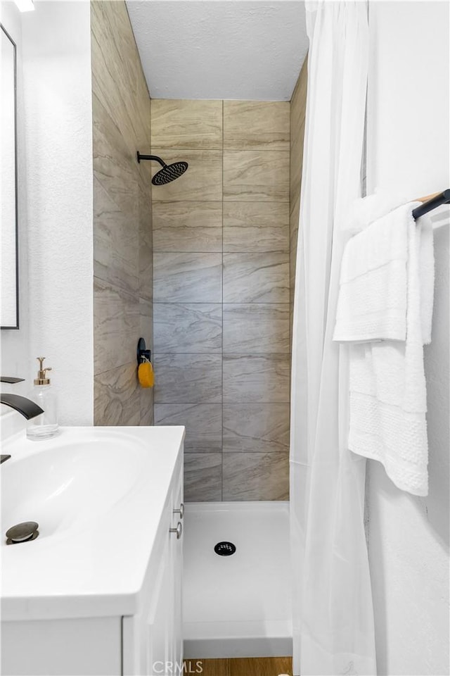 19436 Chaparral St, Rialto, CA 92376 - full bathroom with vanity and a shower stall
