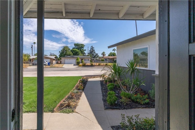 19436 Chaparral St, Rialto, CA 92376 - view of green lawn featuring a residential view