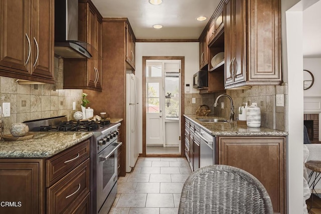 3254 Los Olivos Ln, La Crescenta, CA 91214 - kitchen featuring stainless steel appliances, wall chimney range hood, light stone countertops, decorative backsplash, and ornamental molding