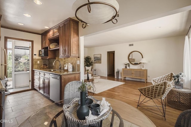 3254 Los Olivos Ln, La Crescenta, CA 91214 - kitchen with dishwasher, backsplash, black microwave, recessed lighting, and light stone countertops