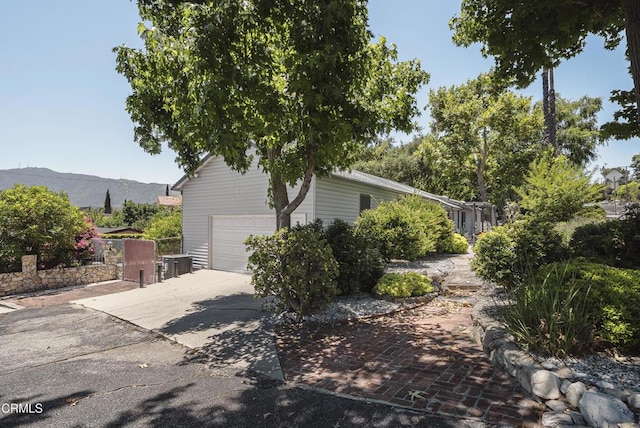3254 Los Olivos Ln, La Crescenta, CA 91214 - view of property exterior featuring a garage and concrete driveway