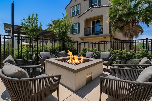2310 Stardust Gln, Escondido, CA 92025 - view of patio featuring an outdoor living space with a fire pit