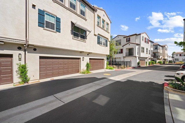 2310 Stardust Gln, Escondido, CA 92025 - view of asphalt street with a residential view, curbs, and sidewalks