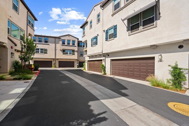 2310 Stardust Gln, Escondido, CA 92025 - view of asphalt road featuring a residential view