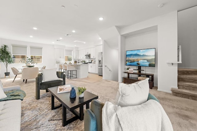 2310 Stardust Gln, Escondido, CA 92025 - living room featuring recessed lighting, stairway, and light carpet