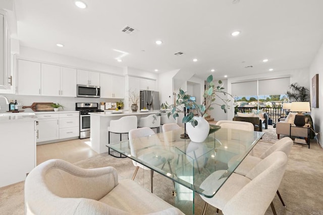 2310 Stardust Gln, Escondido, CA 92025 - dining area featuring recessed lighting and light colored carpet