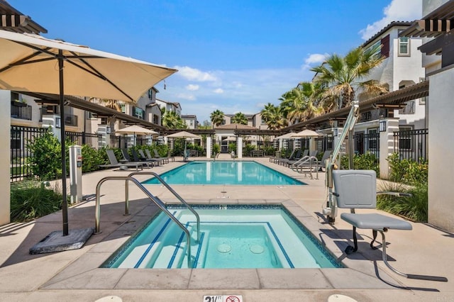 2310 Stardust Gln, Escondido, CA 92025 - community pool with a hot tub, a patio area, and a residential view