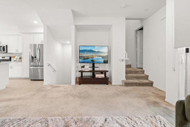 2310 Stardust Gln, Escondido, CA 92025 - living room featuring light colored carpet, recessed lighting, and stairway