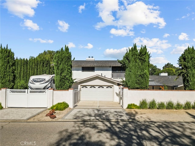 4790 Adam Rd, Simi Valley, CA 93063 - traditional home featuring a gate, a fenced front yard, and stucco siding