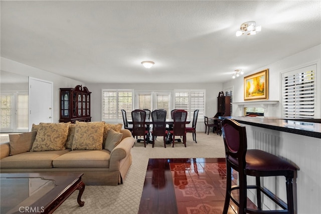 4790 Adam Rd, Simi Valley, CA 93063 - living room featuring dark carpet and a fireplace