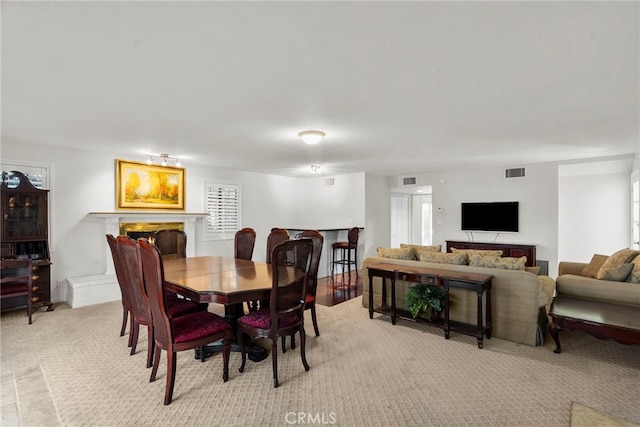 4790 Adam Rd, Simi Valley, CA 93063 - dining space with a fireplace and light carpet