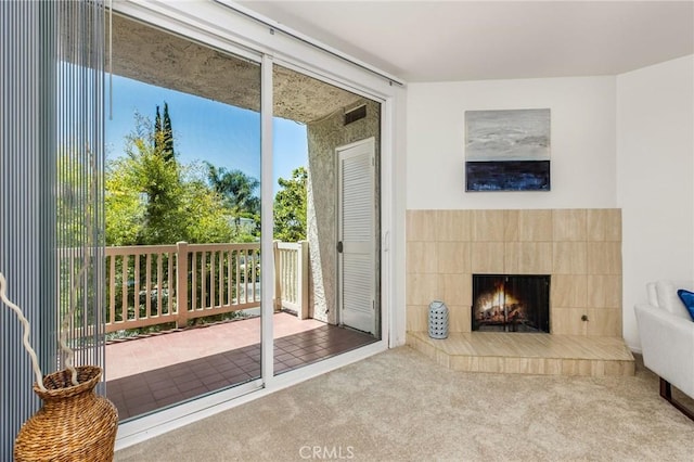 14315 Riverside Dr Unit 209, Sherman Oaks, CA 91423 - doorway with carpet flooring and a fireplace