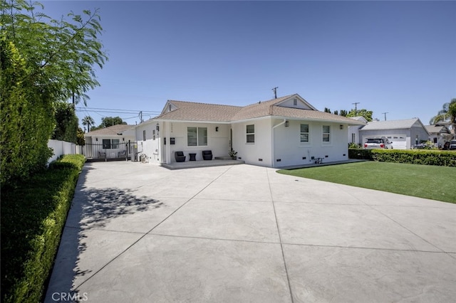 15256 Clymer St, San Fernando, CA 91345 - view of front of home featuring concrete driveway and stucco siding