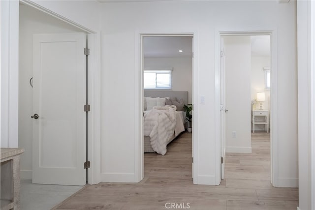 15256 Clymer St, San Fernando, CA 91345 - hall with light wood-type flooring and baseboards