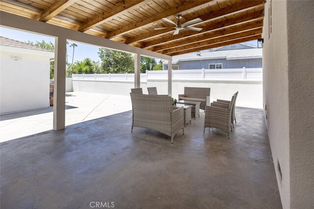 15256 Clymer St, San Fernando, CA 91345 - fenced backyard with a patio, ceiling fan, and outdoor lounge area