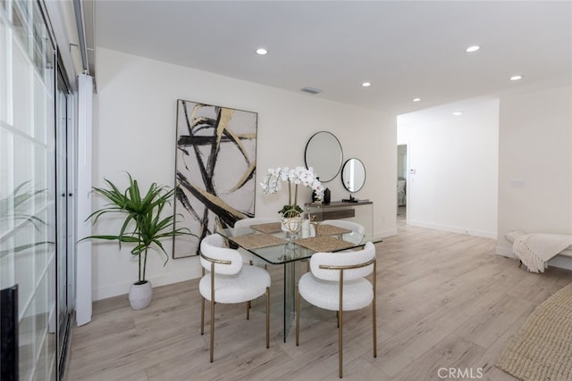 15256 Clymer St, San Fernando, CA 91345 - dining space featuring light wood finished floors and recessed lighting