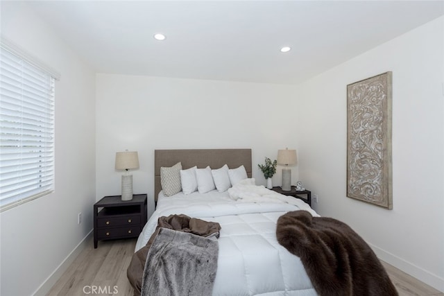 15256 Clymer St, San Fernando, CA 91345 - bedroom with light wood finished floors and recessed lighting