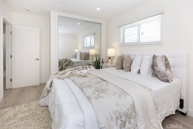 15256 Clymer St, San Fernando, CA 91345 - bedroom featuring a closet, light wood-style flooring, and recessed lighting