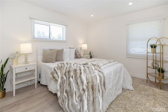 15256 Clymer St, San Fernando, CA 91345 - bedroom with light wood finished floors and recessed lighting