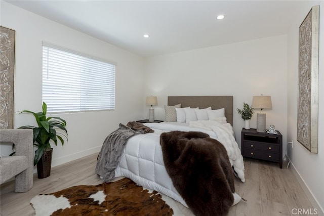 15256 Clymer St, San Fernando, CA 91345 - bedroom featuring light wood-style floors and recessed lighting