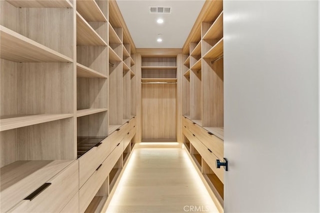 14738 Otsego St, Sherman Oaks, CA 91403 - walk in closet featuring light wood-style floors