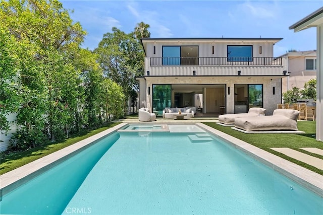 14738 Otsego St, Sherman Oaks, CA 91403 - rear view of property with a balcony, an outdoor living space, and a pool with connected hot tub