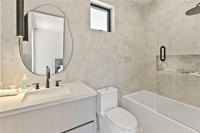 14738 Otsego St, Sherman Oaks, CA 91403 - full bathroom featuring vanity, tile walls, and enclosed tub / shower combo