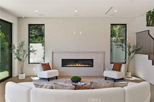 14738 Otsego St, Sherman Oaks, CA 91403 - living room featuring a premium fireplace, recessed lighting, and wood finished floors